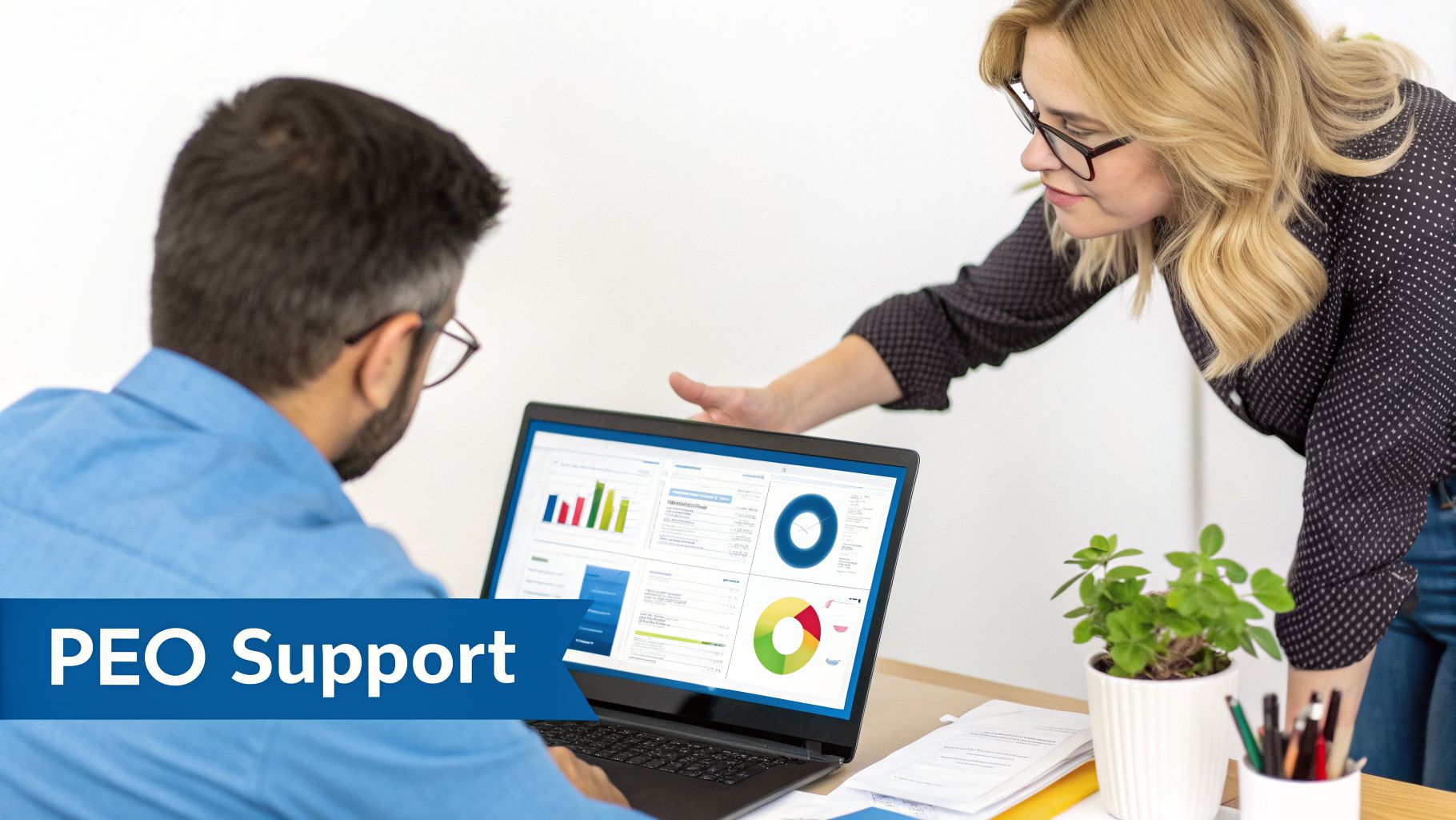 Two professionals analyze data on a laptop with charts, illustrating PEO support and collaboration.