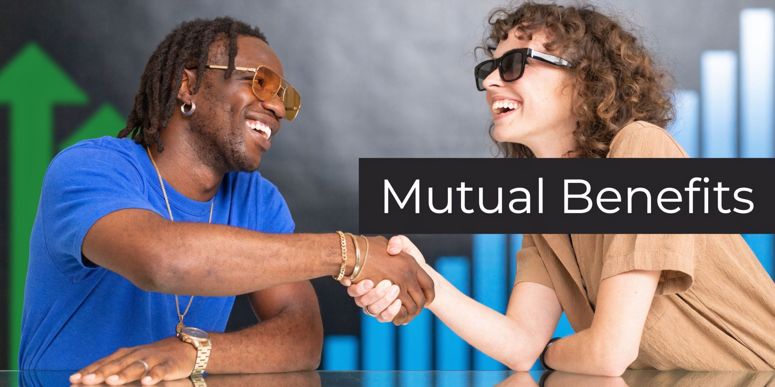A diverse man and woman shaking hands while smiling in front of a blue graph background.