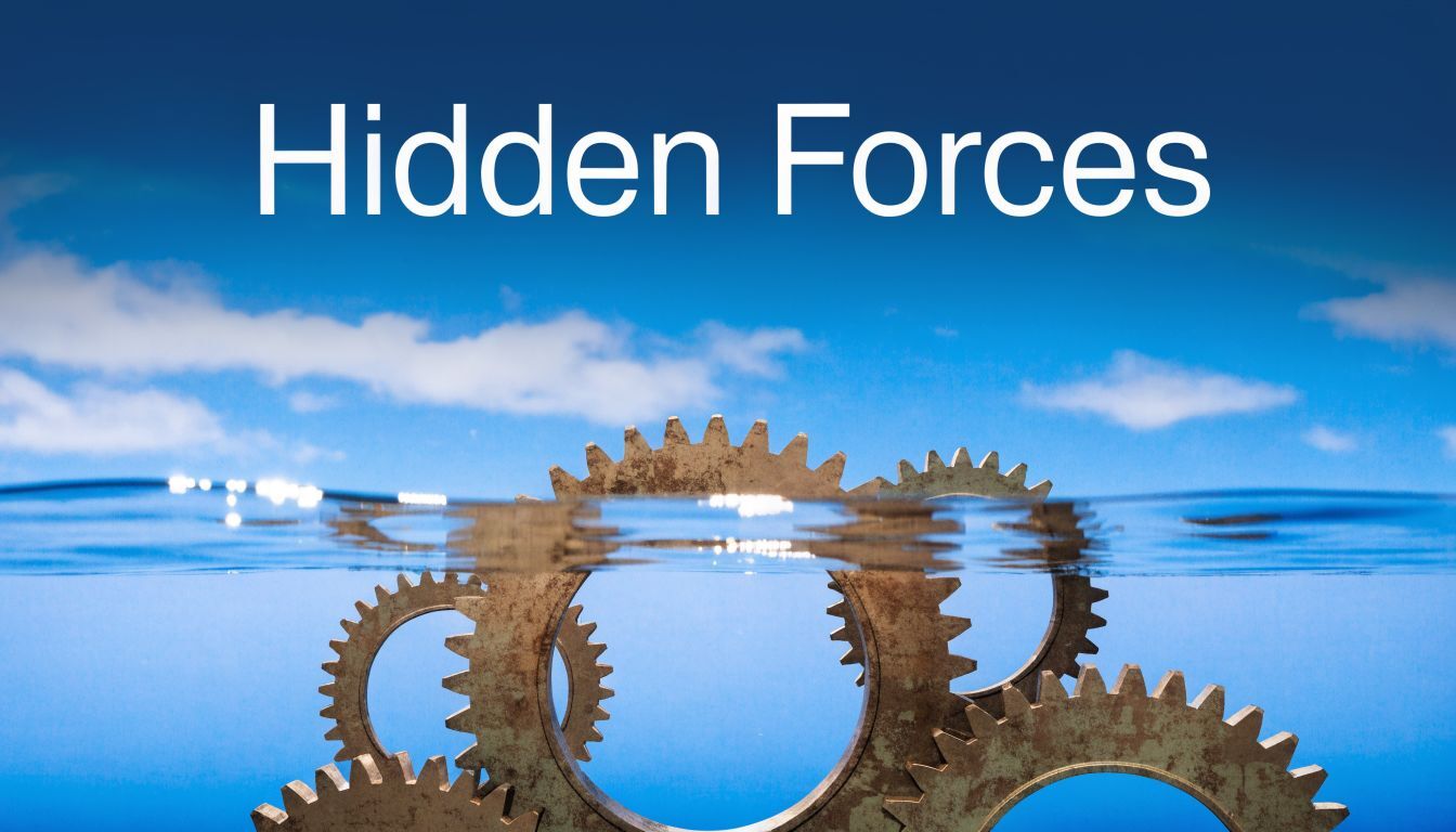 Rusty gears submerged in clear blue water representing hidden mechanical forces and underlying structural complexity.